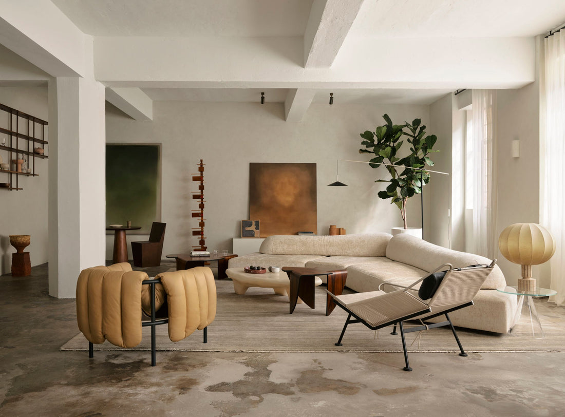 Serene Japandi living room featuring minimalist furniture with warm wood tones and neutral textiles