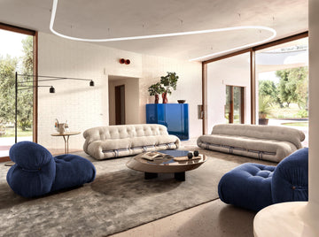 Soriana sofa styled for spring with round mid century coffee table