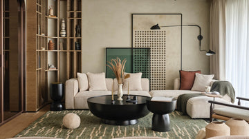 Wabi-Sabi oak round table showcasing natural wood grain and organic imperfections, embodying rustic elegance in Japandi interiors.