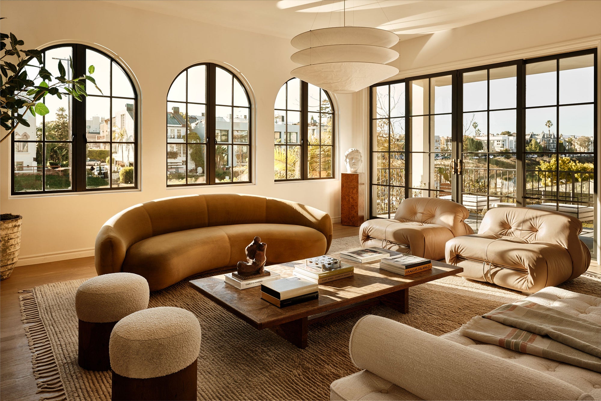 brown velvet curved sofa (210 cm) with plush upholstery and modern design