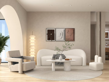 Bouclé armchair with soft texture paired with rustic wooden side table in Wabi-Sabi interior.