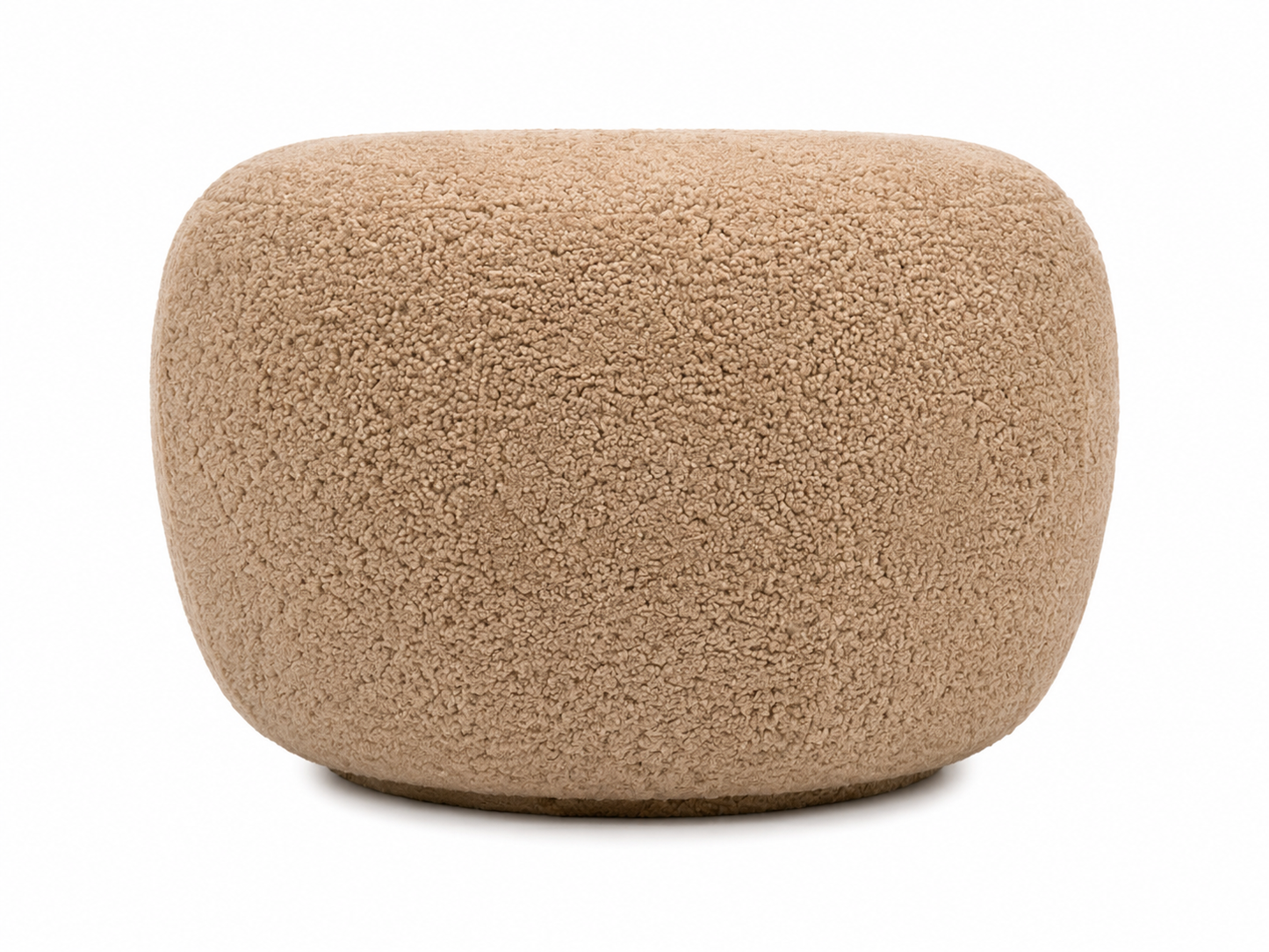 A modern, organic-shaped pouf or ottoman with a genuine sheepskin fabric in a warm honey color, shown on a plain white background.