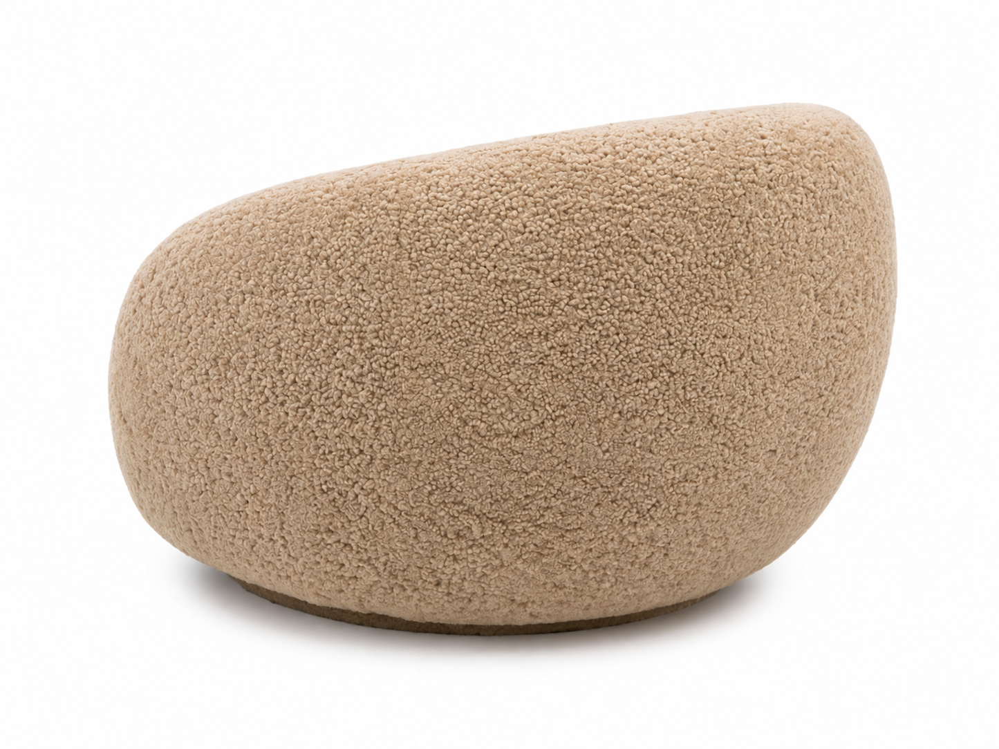 A modern, organic-shaped pouf or ottoman with a genuine sheepskin fabric in a warm honey color, shown on a plain white background.
