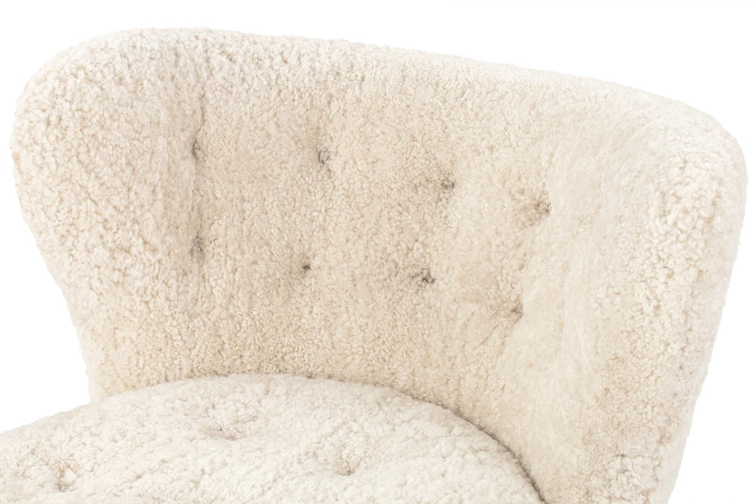 little petra backrest close up in off white genuine sheepskin on a white background